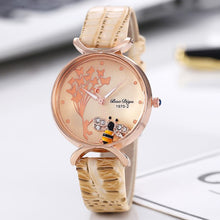 Load image into Gallery viewer, Ladies cream leather watch with an encased moving bee charm
