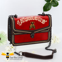Load image into Gallery viewer, Rock chic styled vegan leather handbag featuring bold golden "Fabulous" embroidery with vintage gold bee embellishment in dark red colour.