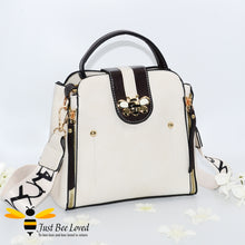 Load image into Gallery viewer, Flap over bumblebee two-toned vegan friendly leather handbag in ivory cream colour.