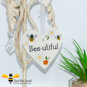 3 ceramic hanging heart plaques with bees and daisies with "beautiful" sentiment