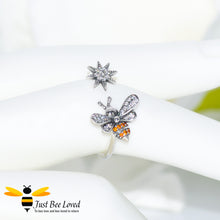 Load image into Gallery viewer, Sterling silver 925 open ring featuring a bee and star with white and orange zirconia