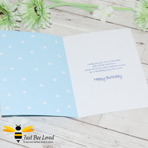 Just Bee Loved Little Bee Happy 1st Birthday for boy greeting card featuring a cute bumble bee with a party hat with the number 1 and balloons design by Artist Yasmin Flemming