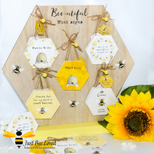 Load image into Gallery viewer, A collection of wooden mini message signs with bee-themed decorations, featuring various messages such as 'Mummy to Bee', 'Queen Bee of the Kitchen', and 'Meant to Bee'.