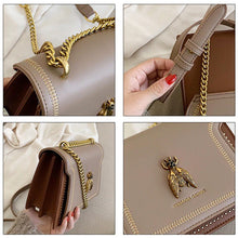 Load image into Gallery viewer, PU leather two tone brown handbag featuring a large gold bee embellishment