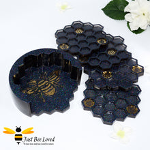 Load image into Gallery viewer, Set of 4 handmade resin honeycomb bumblebee coasters with matching holder in black and gold.