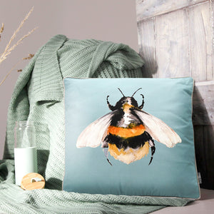 Meg Hawkins Bumblebee scatter cushion in teal blue colour