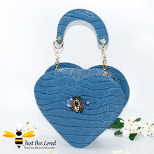 Load image into Gallery viewer, Blue faux patent leather heart-shaped handbag featuring embossed crocodile skin, with bee embellishment