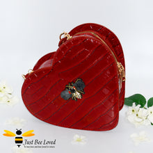 Load image into Gallery viewer, Red faux patent leather heart-shaped handbag featuring embossed crocodile skin, with bee embellishment