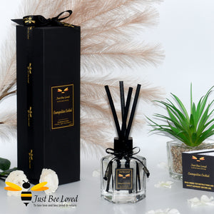 Luxury hexagon shaped black rattan vegan reed diffuser. Fragrance cosmopolitan cocktail