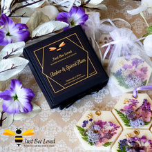 Load image into Gallery viewer, Luxury gift box of scented botanical vegan wax tablets decorated with purple natural flowers, gold bee, fragrance amber &amp; spiced plum