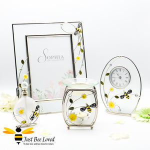 Frosted glass and wire metal detail of bee and flowers photo frame, oil burner, perfume bottle, mantel clock from the Sophia Classic collection