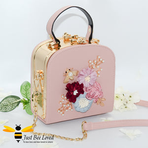 hand-crafted 3D embellished square metal handbag featuring a bouquet of flowers, golden leaves with a pearlised bee in salmon pink