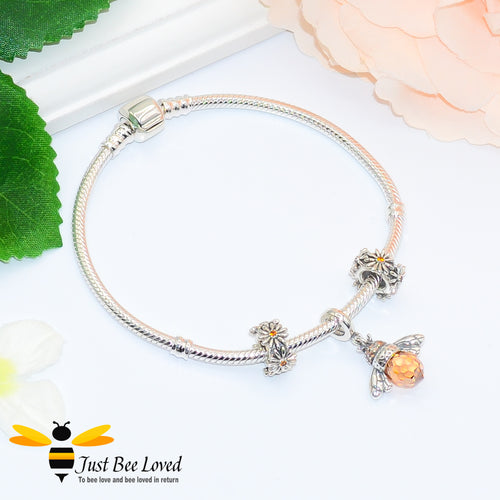 Sterling Silver Snake bracelet with two daisy charms and queen bee pendant with czech zirconia crystals
