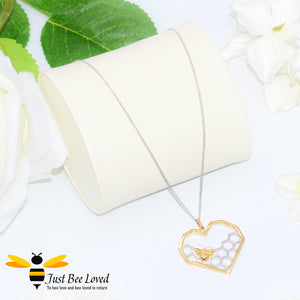 Honeycomb heart with little honey bee sterling silver pendant neck.  18kt gold plated heart frame and honey bee on silver chain