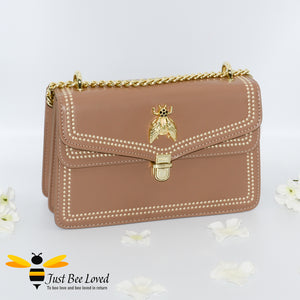 Taupe vegan leather evening handbag with embroidery edged stitching and large gold bee embellishment