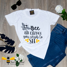 Load image into Gallery viewer, Women's white cotton crew neck T-shirt with Mahatma Gandhi quote "Be the change you want to see" with a bumblebee design