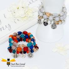 Load image into Gallery viewer, Bohemian gypsy styled 3-layer stack beaded bracelet featuring bee, love-heart and sunflower charms