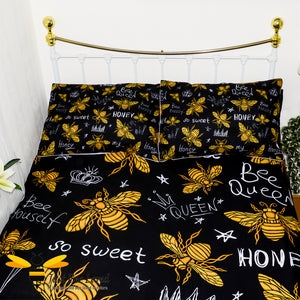 queen honey bee duvet bedding set featuring golden honey bees with stars, crowns and bee related statements print