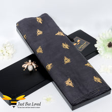 Load image into Gallery viewer, ladies dark grey lightweight scarf gold bee print, gift boxed with gold bee brooch.