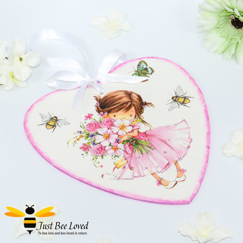 Handmade decoupaged wooden love heart plaque painted and decorated with bumblebees and cute girl holding a bunch of flowers