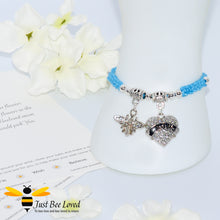 Load image into Gallery viewer, handmade Shamballa wish mother bracelet in light blue featuring a bee and love heart engraved with &quot;Mom&quot; with sentimental verse card