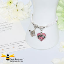 Load image into Gallery viewer, handmade white Shamballa wish charm bracelet featuring a bee and love heart engraved with &quot;Sister&quot; with sentimental verse display card