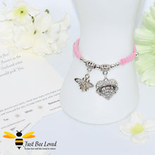 Load image into Gallery viewer, Pink Shamballa wish bracelet featuring a crystal bee and heart charm engraved with "Sister" and a sister verse card.