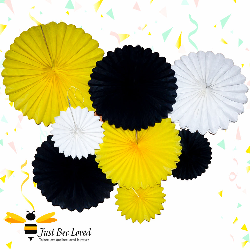 A set of 8 bee themed paper hanging fans in yellow, black, and white.
