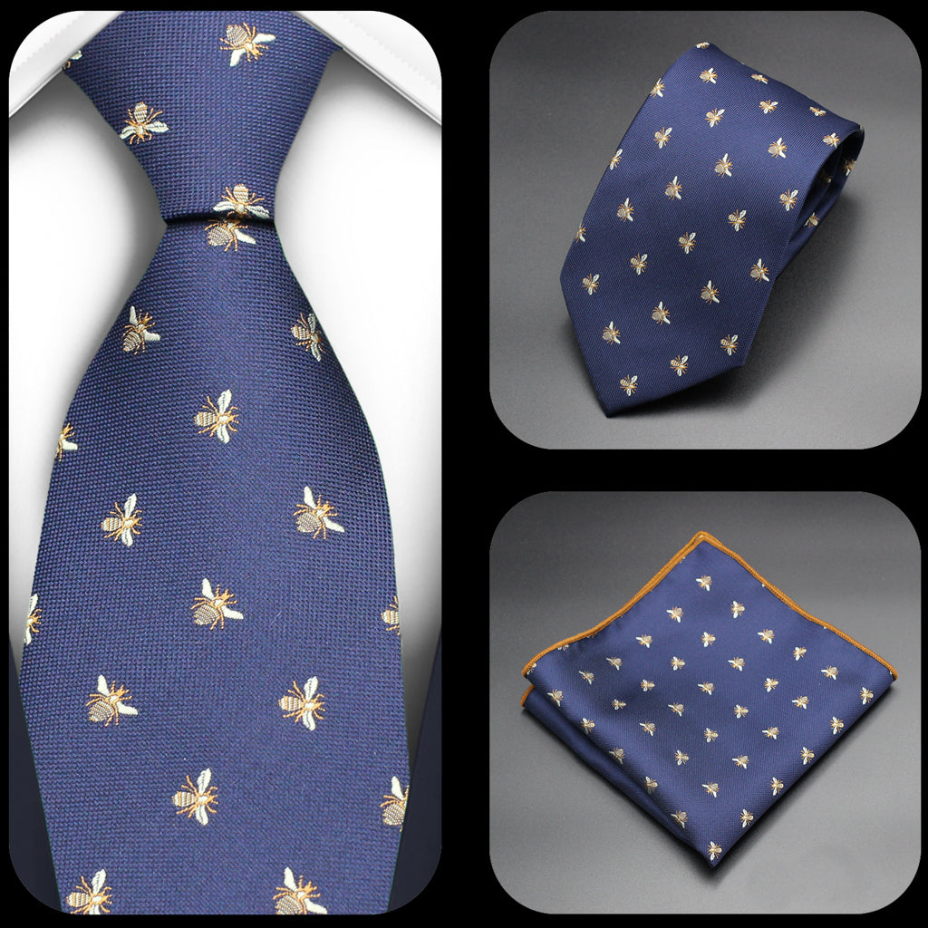 a navy blue neck tie with matching pocket square handkerchief with an all over embroidery bee design.
