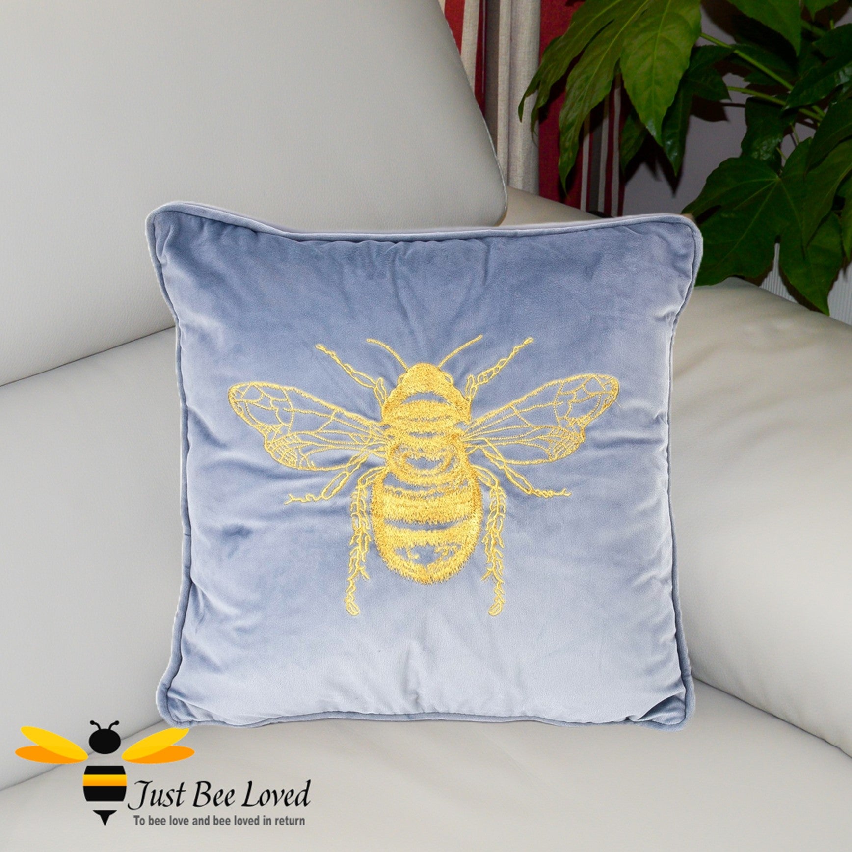 Blue velvet embroidered gold bee sofa cushion