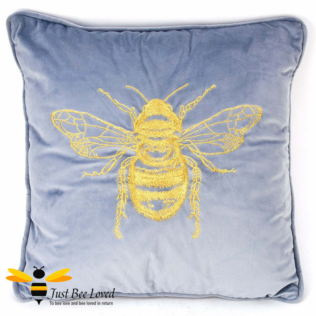 Sky blue velvet embroidered gold bee scatter cushion.