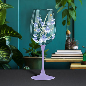 Tall stem wine glass with bluebells and bumble bees