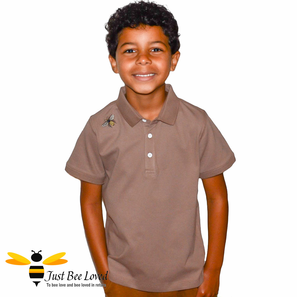 Boy wearing bee embroidery motif brown polo t-shirt
