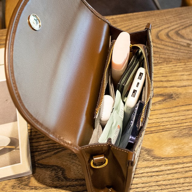 Brown leather bee bag