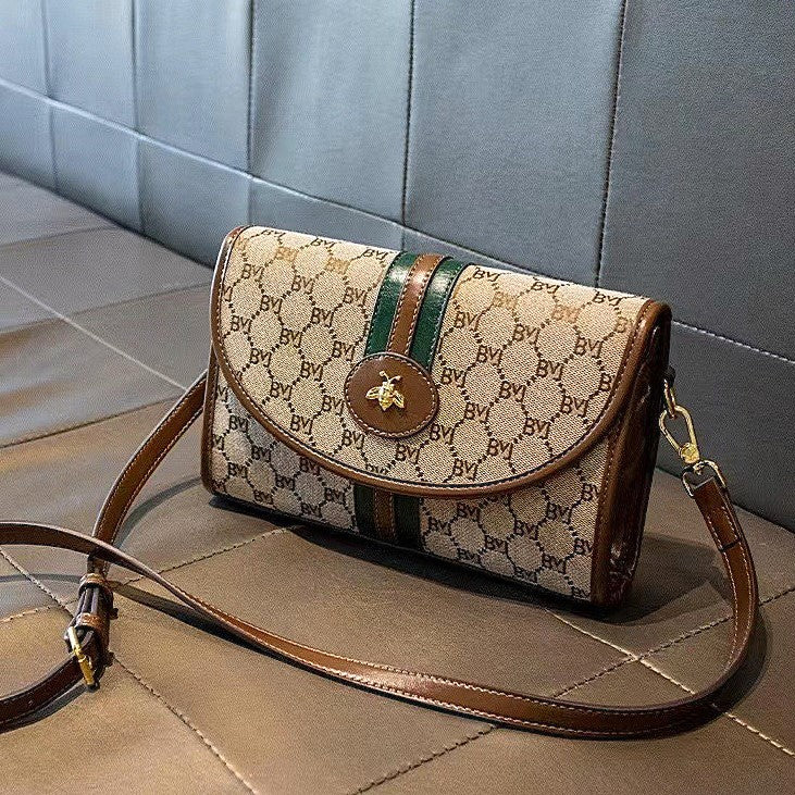 Brown and beige envelope style faux leather bee handbag