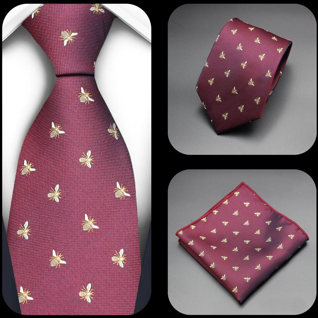 Burgundy neck tie and pocket square handkerchief set with an embroidered bee design.