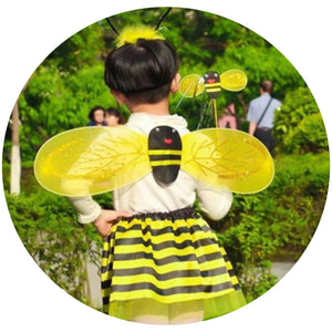 Young child wearing a bumble bee fancy dress costume