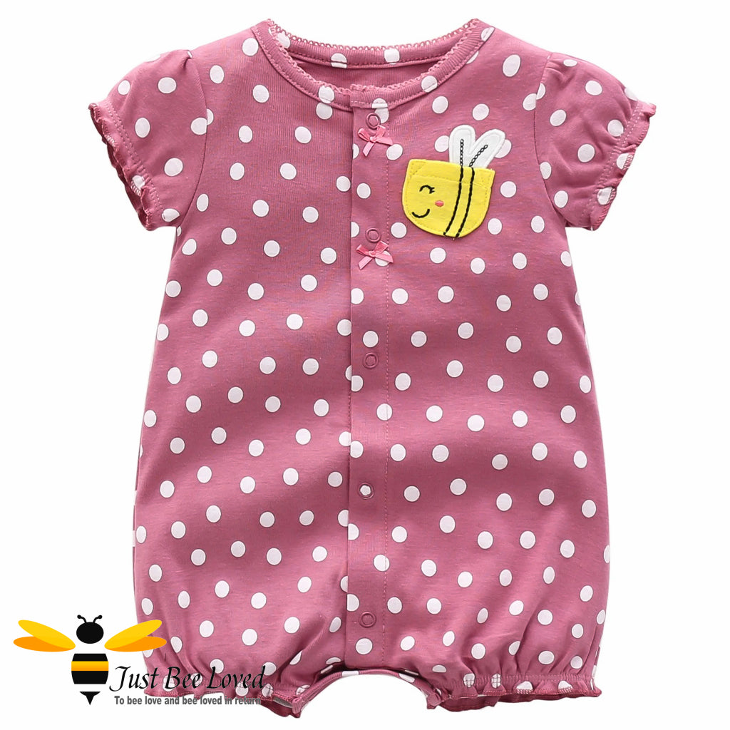 short sleeve mauve baby romper with white polka dots and bee applique.