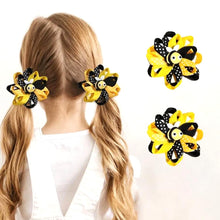 Load image into Gallery viewer, Girl wearing bee themed petal bow hair clips