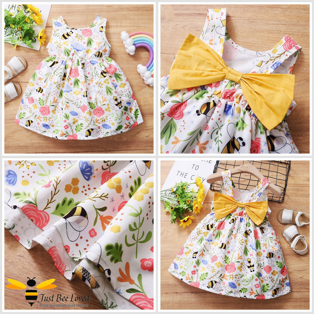 Girl's white summer smock dress with all over print of bees and flowers.