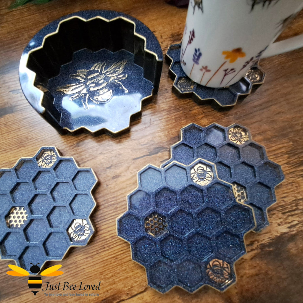 Handmade bee themed hexagonal black and gold coasters with holder.