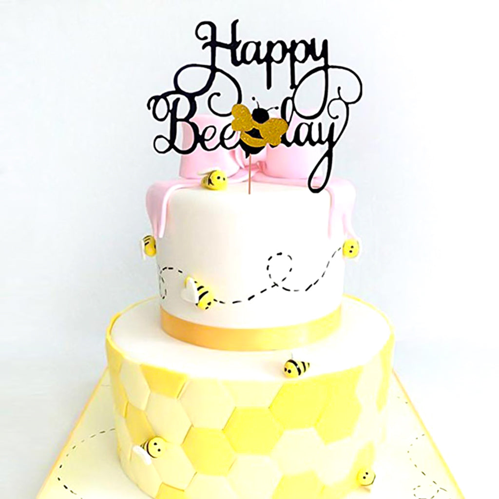 Happy brithday party cake topper with gold bee.