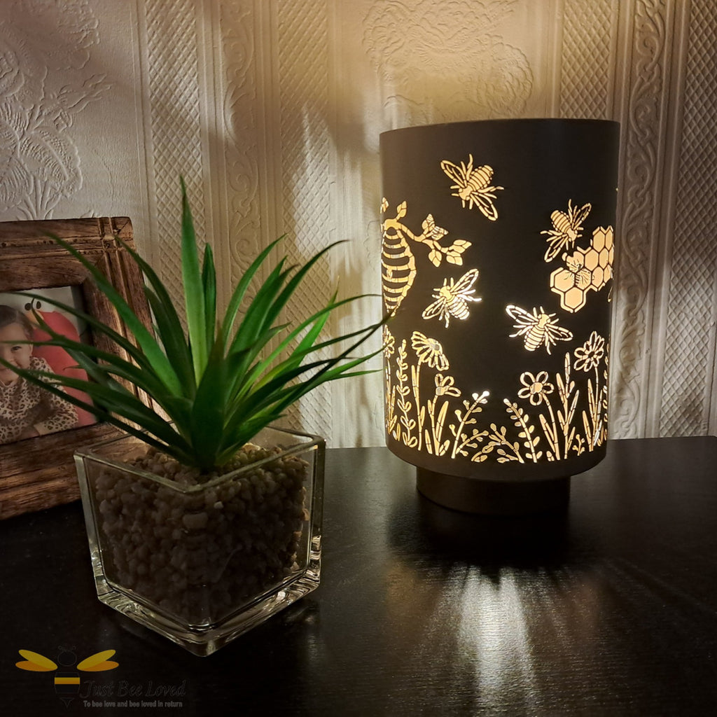 Silhouette gold metal honey bee table lamp.