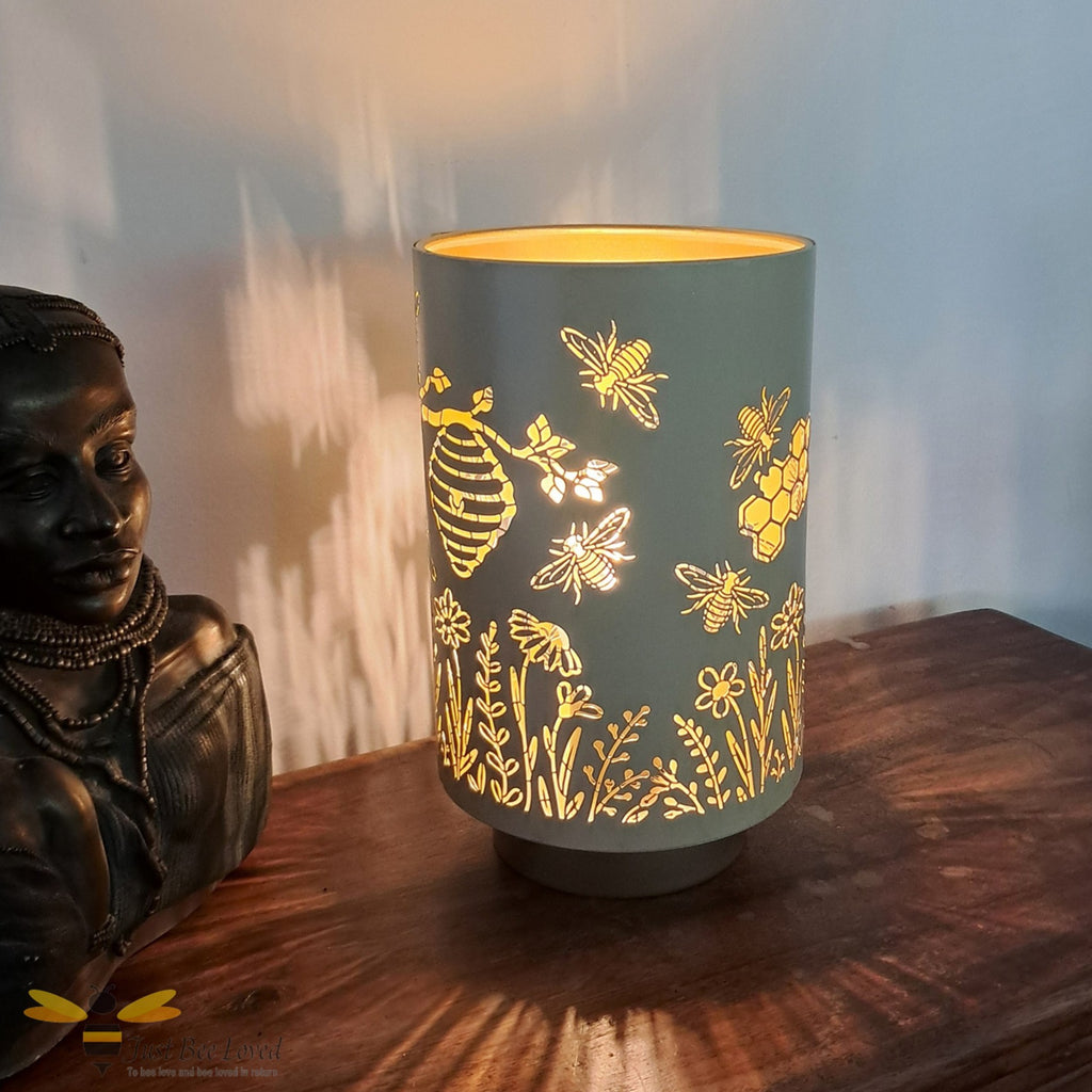 Gold metallic silhouette honey bee table lamp.