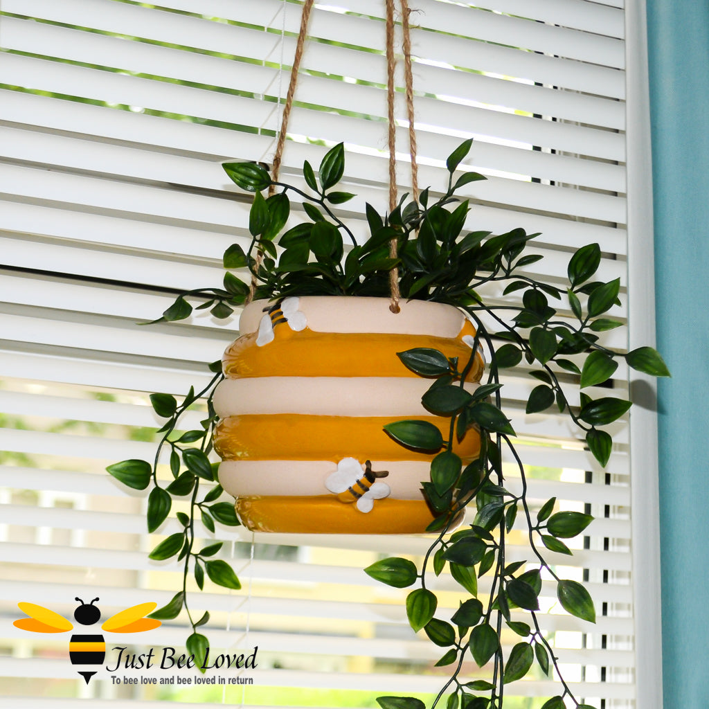 Hanging planter pot, bee hive shape with hand painted decorative bees.