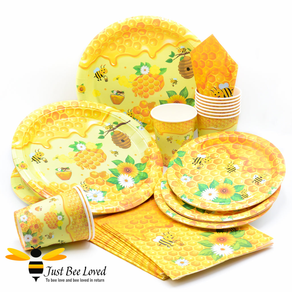 Bee themed orange disposable party tableware set with plates, cups and napkins. 