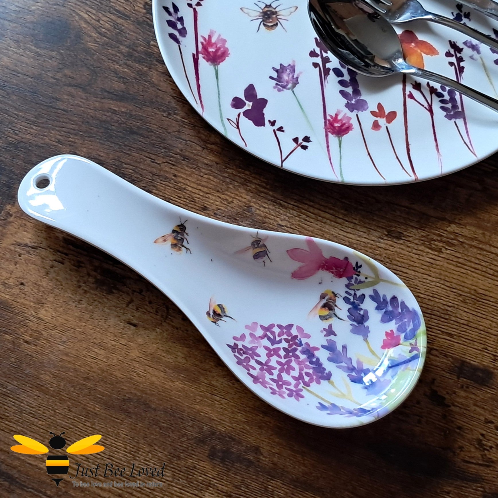 Decorative spoon rest with floral and bee design by Jennifer Rose.