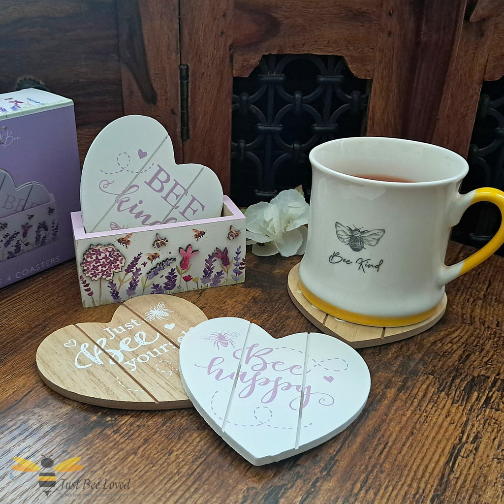 Heart-shaped wooden coasters with motivational bee themed phrases, bees and flowers design.