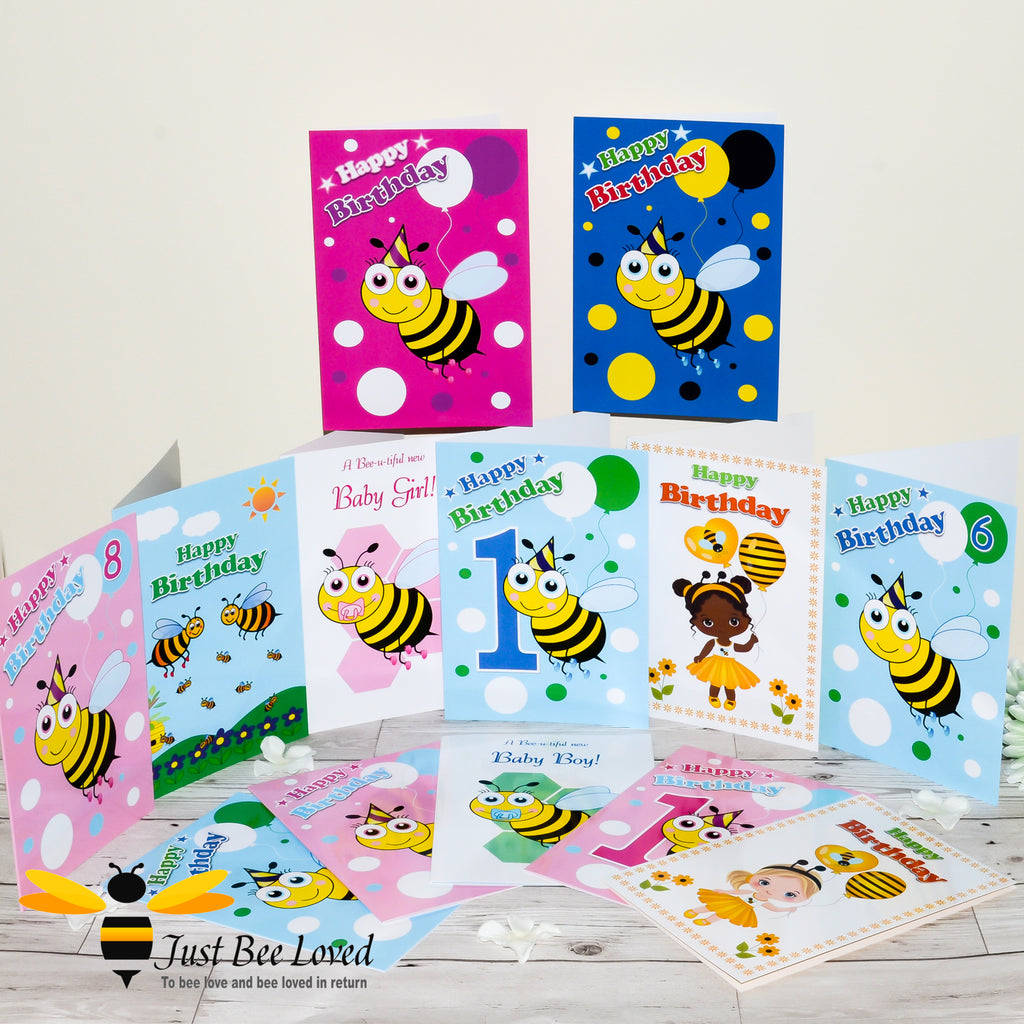 a display of colourful birthday bee themed cards for children from the 'Little Bee' greeting cards collection by Just Bee Loved.