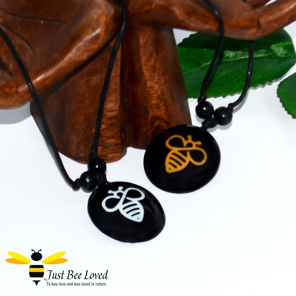 Black cord rope bee pendant necklace